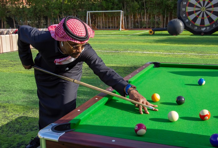 playing outdoor pool